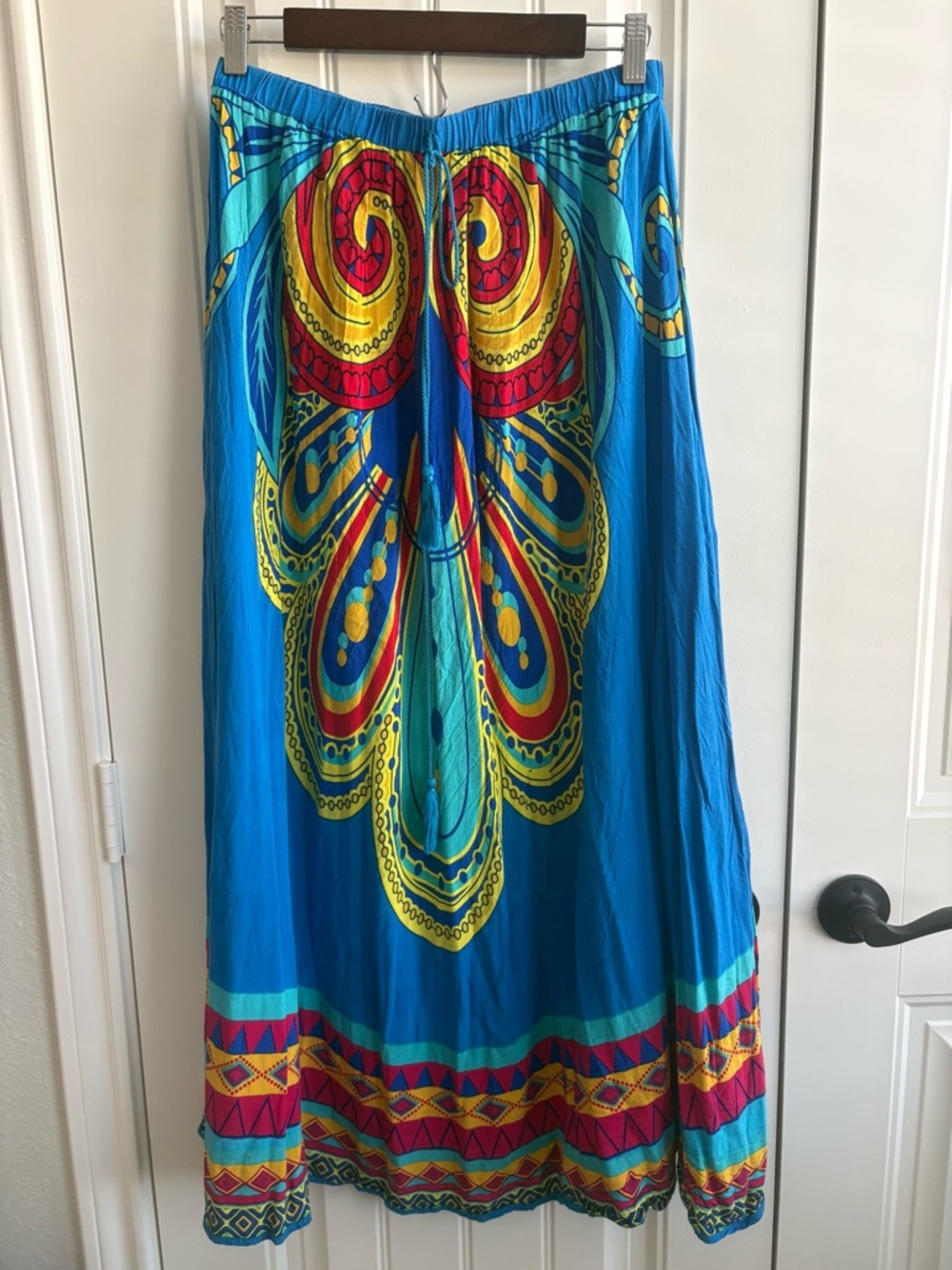Magic Blue Waistband Maxi Skirt with Red and Yellow Swirl Print
